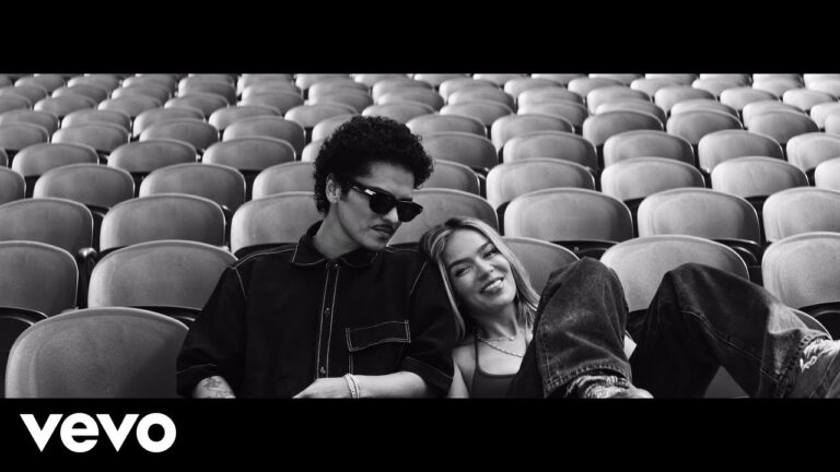 "Still" official Video // KAROL G (right), Bruno Mars (left)
